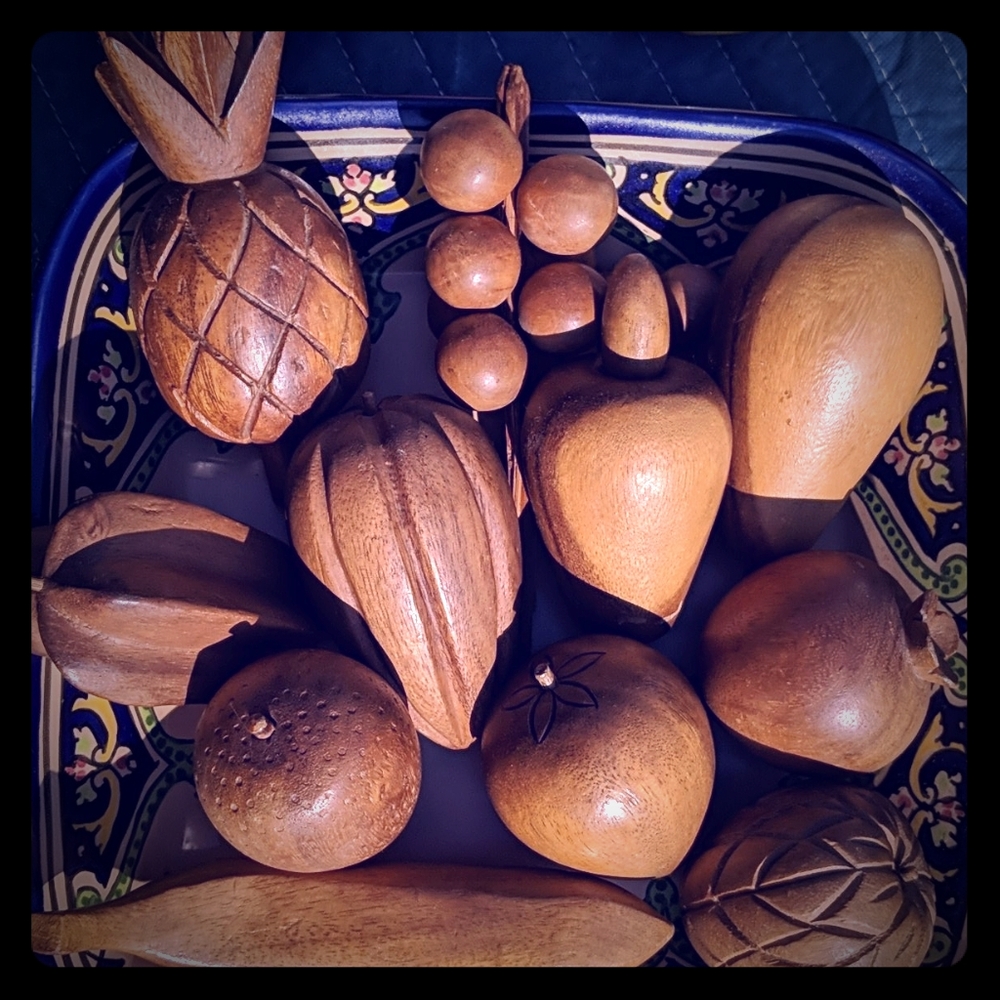 Set of 11 handcarved solid wood fruit.